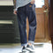 American Vintage Workwear Original Cow Jeans in dark denim with straight fit and mid-rise waist shown from back