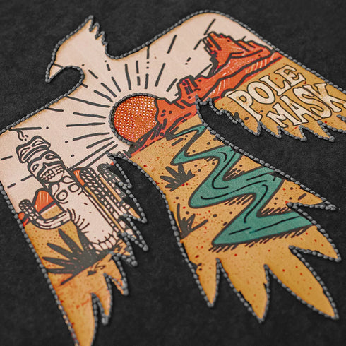 Close-up of a tattoo-style design on a dark background