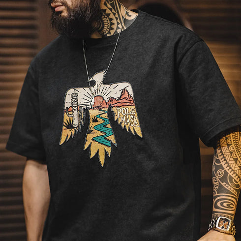 Person wearing a black t-shirt with a colorful eagle design and 'Pole Mask' text.