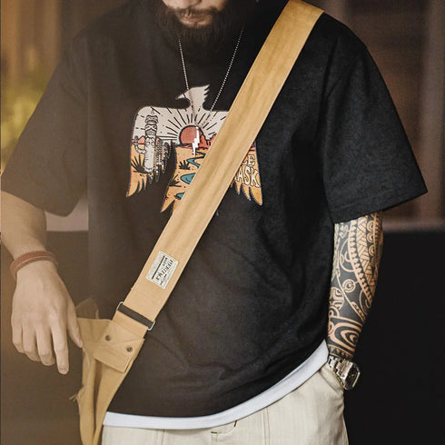 Men's black vintage style Thunderbird print t-shirt with Navajo-inspired design and short sleeves