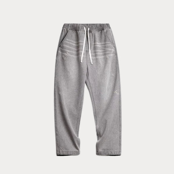 Vintage heavyweight washed gray jeans with elastic waist and distressed straight-leg style.