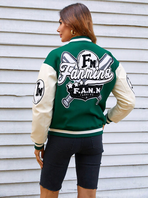 Person wearing a green and beige varsity jacket with 'F.M. Fanmin' branding.
