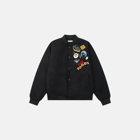 Black jacket with colorful patches on a light gray background