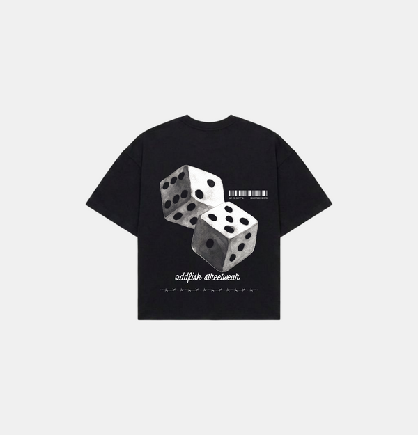 A black short-sleeve t-shirt with a graphic print of three 3D dice in grayscale, a small barcode, and the text 'oldfashioned streetwear' on a light gray background.