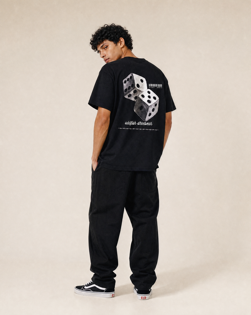 Image of model wearing black roll the dice tshirt
