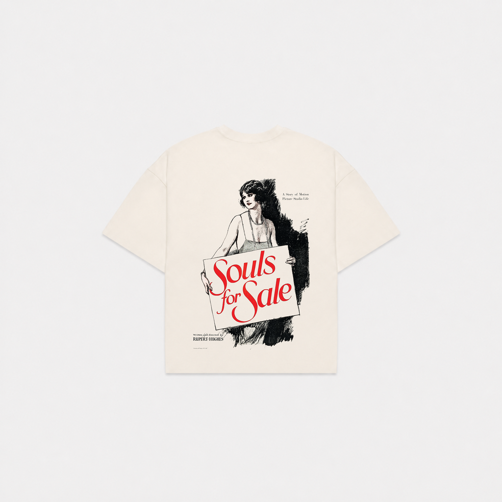 An off-white short-sleeve t-shirt featuring a vintage-style graphic print of a woman holding a sign that reads 'Souls for Sale' in red script, displayed against a light gray background.